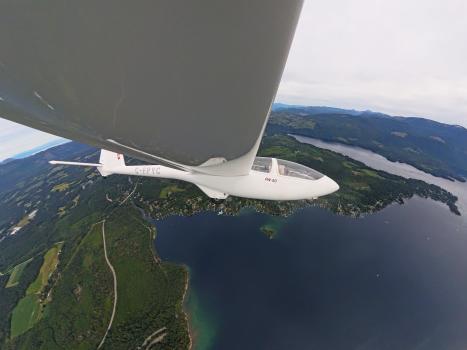 Glider soaring over Sproat Lake